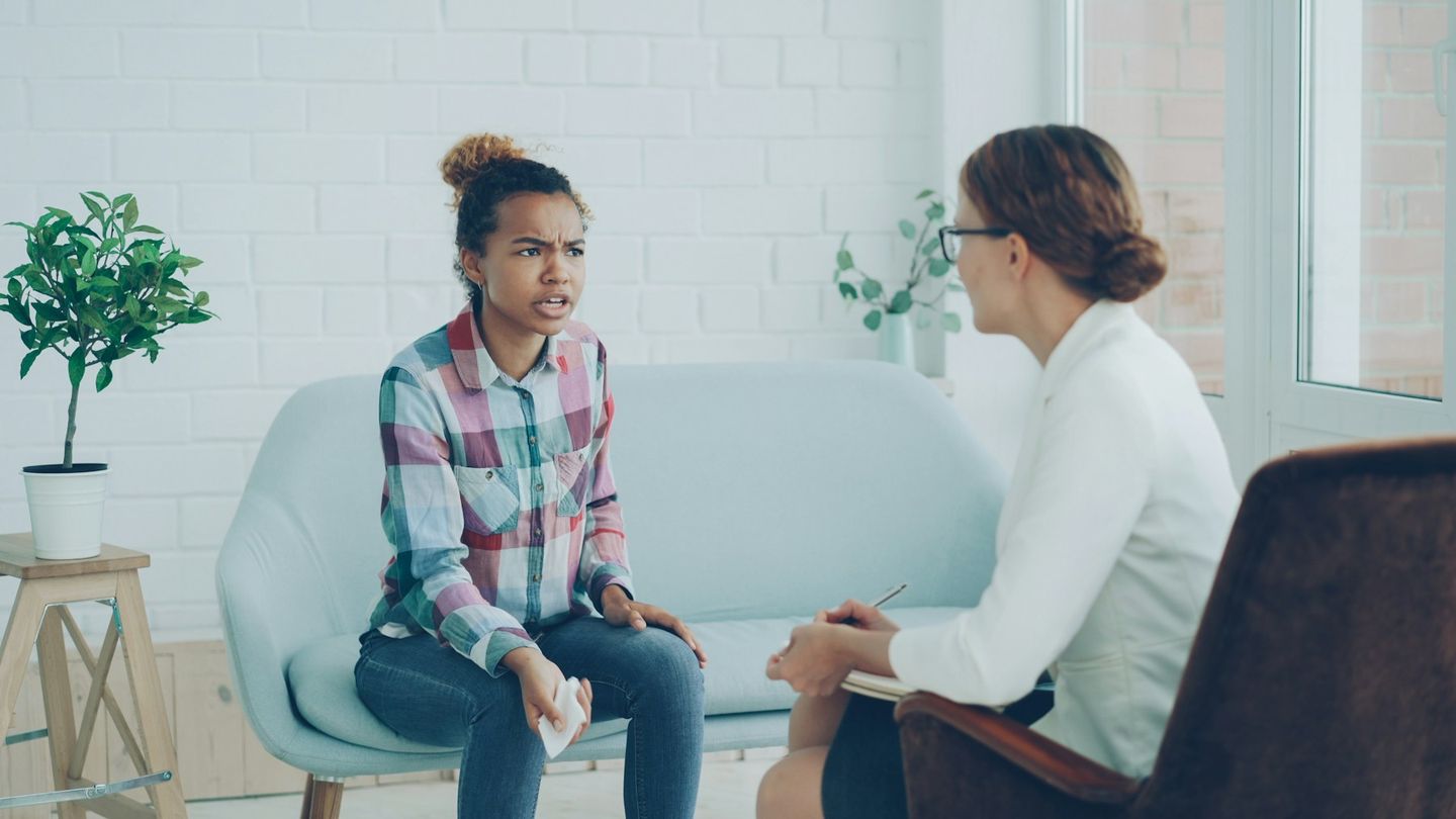 A supportive therapy session in a calm room