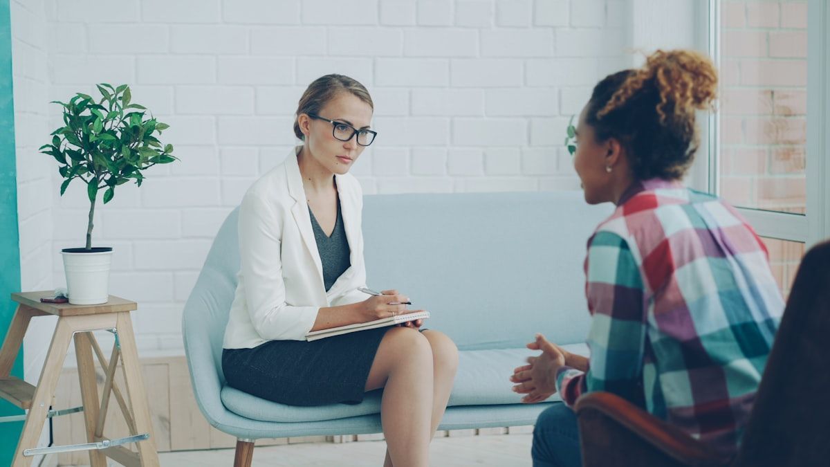 A therapist listening attentively during a session
